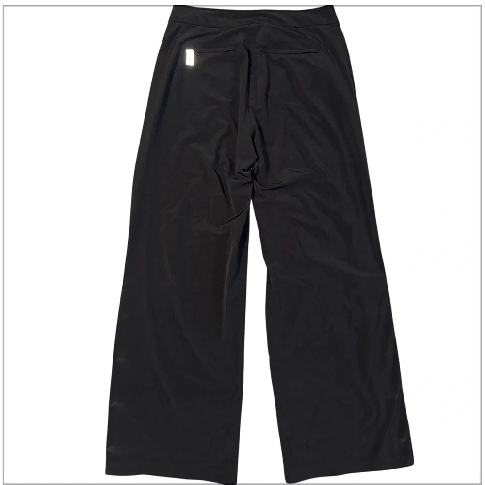 Athleta Gramercy Track Wide Leg Pants Black Size 4 Side Zip Snap Hem Trouser - Picture 2 of 7